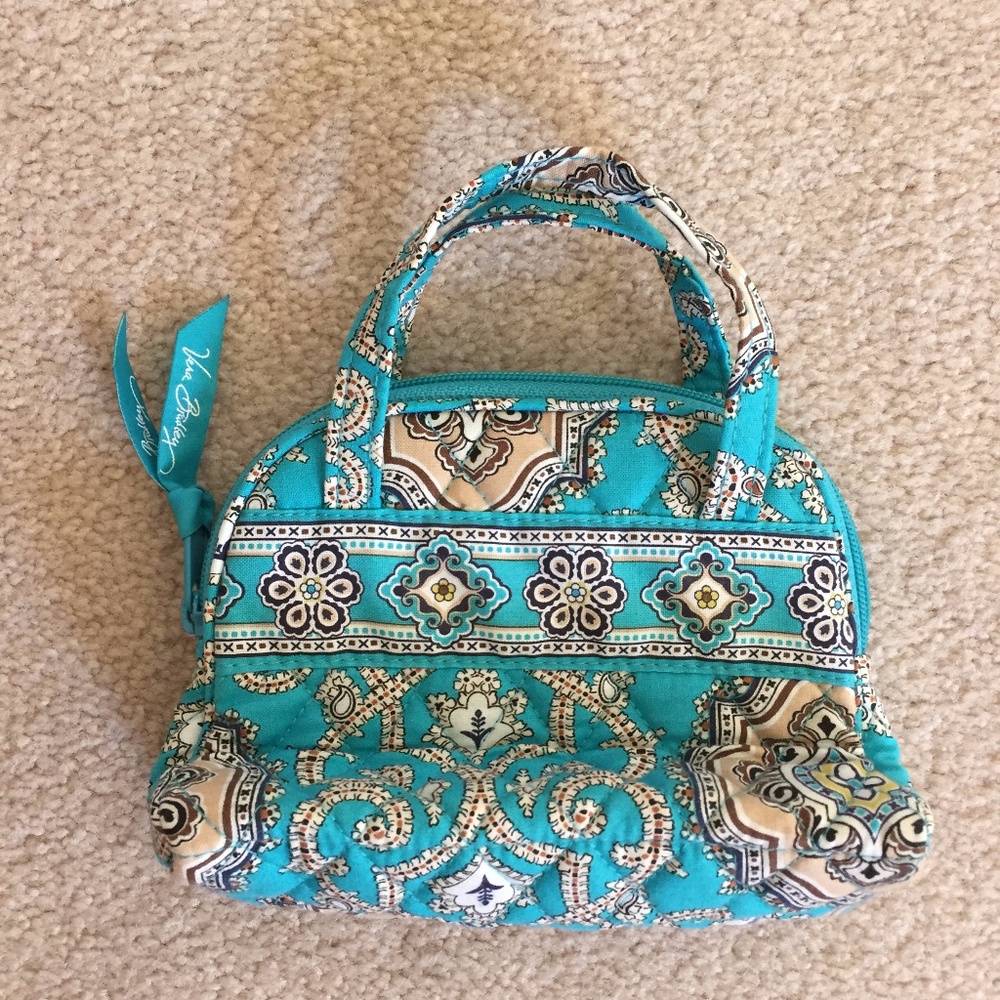 Vera Bradley small handbag with handles.